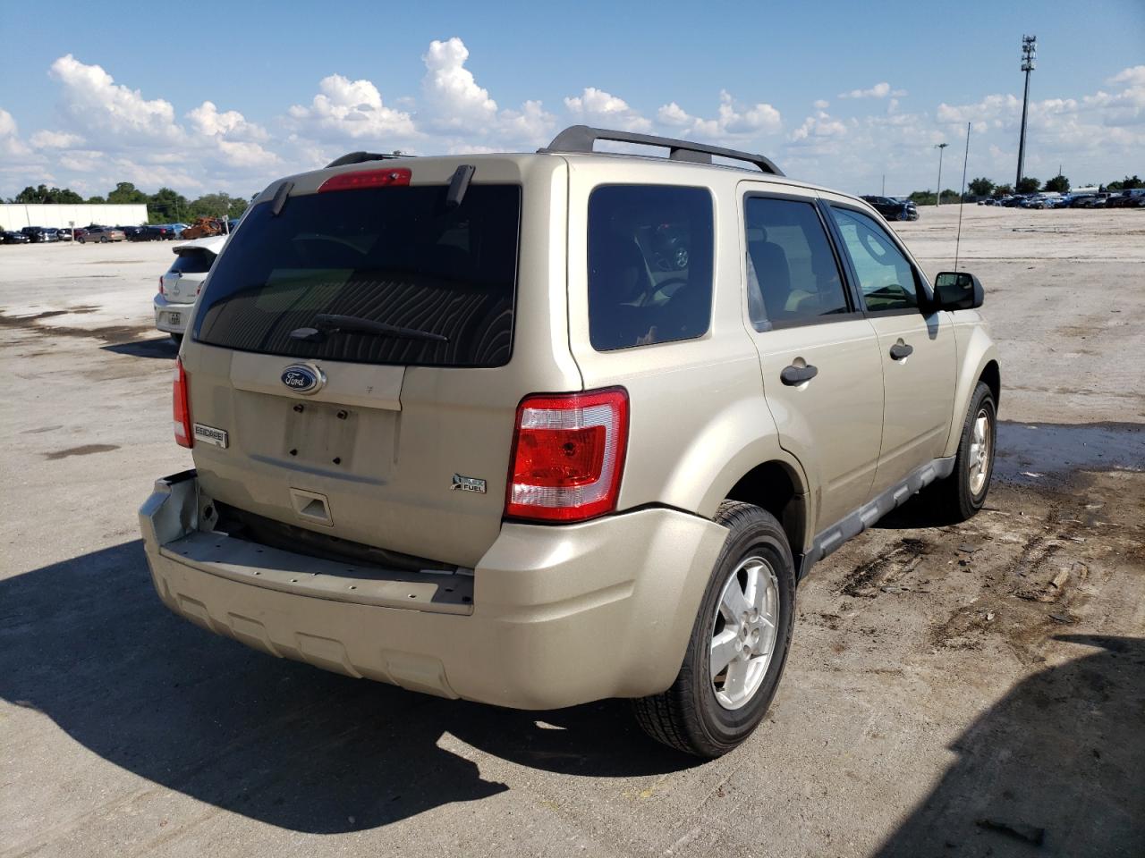 Photo 4 from auction – 2011 FORD ESCAPE XLT with VIN 1FMCU0DG9BKB65928