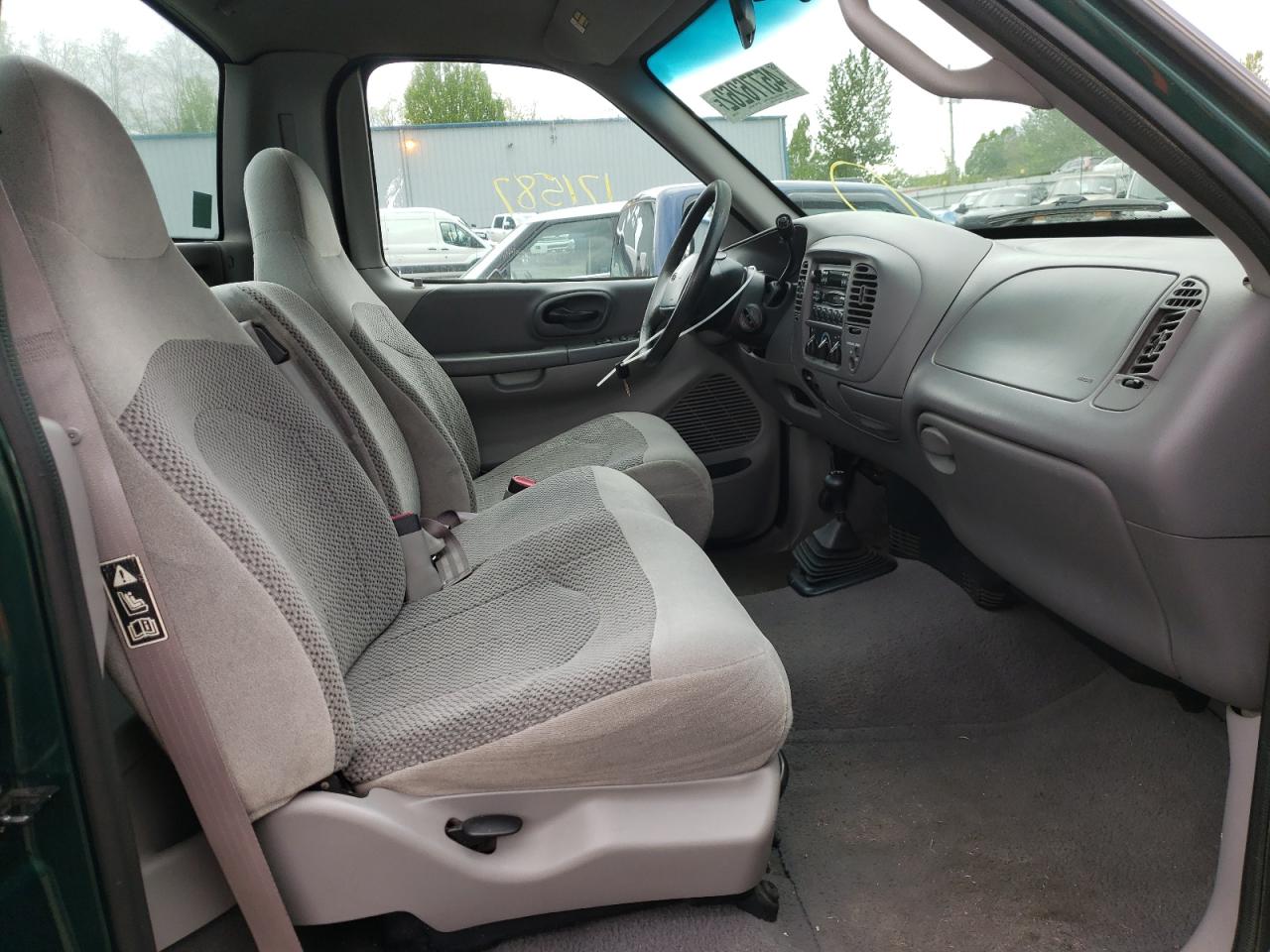 Photo 5 from auction – 1999 FORD F150 with VIN 1FTRF18L3XNB30443