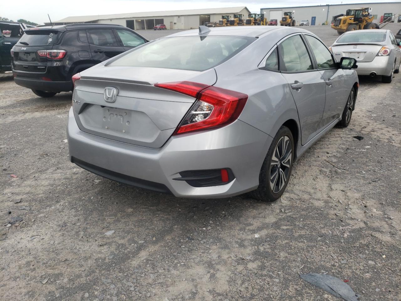 Photo 4 from auction – 2018 HONDA CIVIC EX with VIN JHMFC1F36JX042544