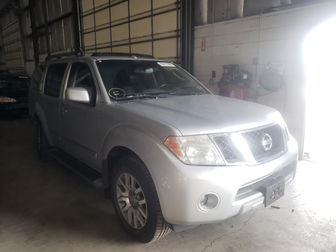 NISSAN PATHFINDER 2011 with VIN 5N1AR1NB6BC614431 - Photo from auction