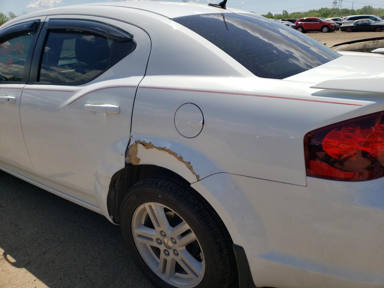 Photo 9 from auction – 2014 DODGE AVENGER SE with VIN 1C3CDZAG1EN217993