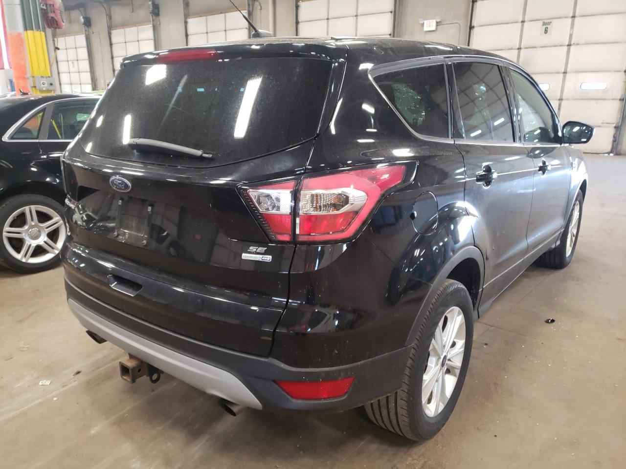 Photo 4 from auction – 2017 FORD ESCAPE SE with VIN 1FMCU9G96HUB81003
