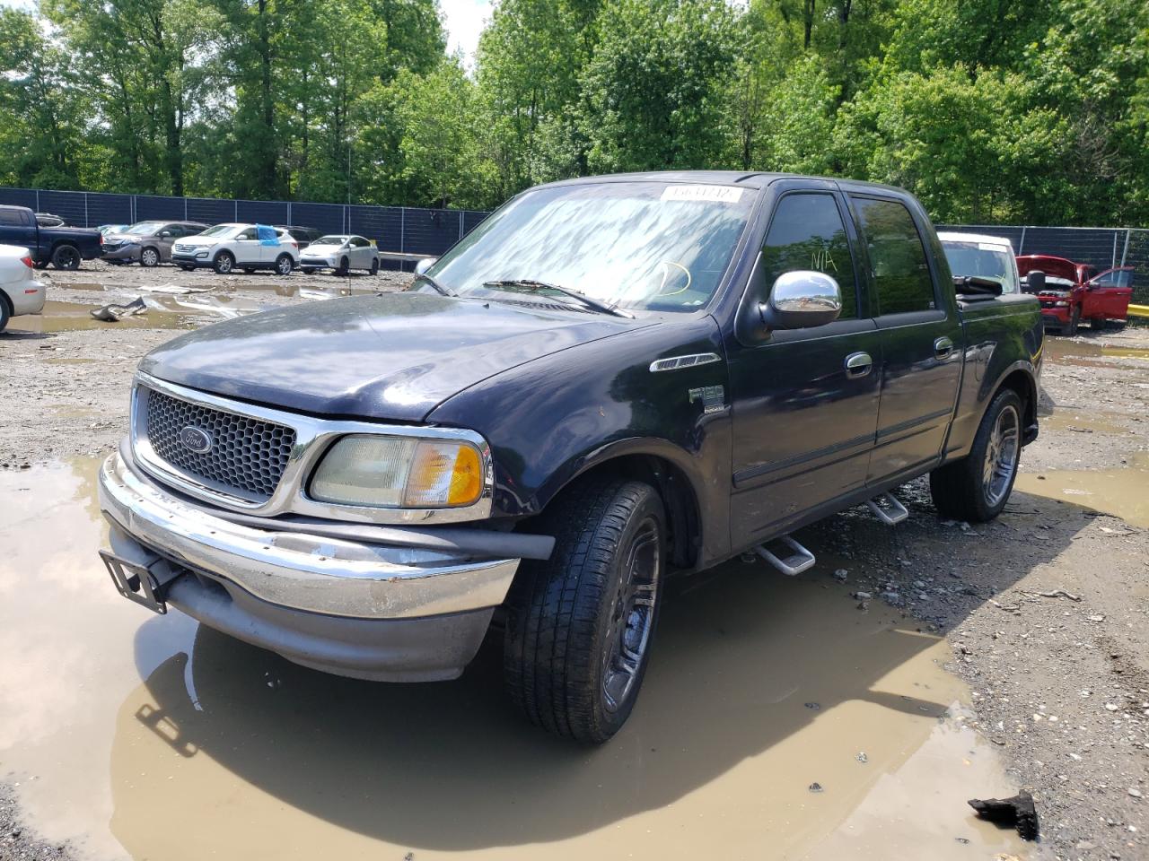 Photo 2 from auction – 2001 FORD F150 SUPER with VIN 1FTRW07LX1KD95042