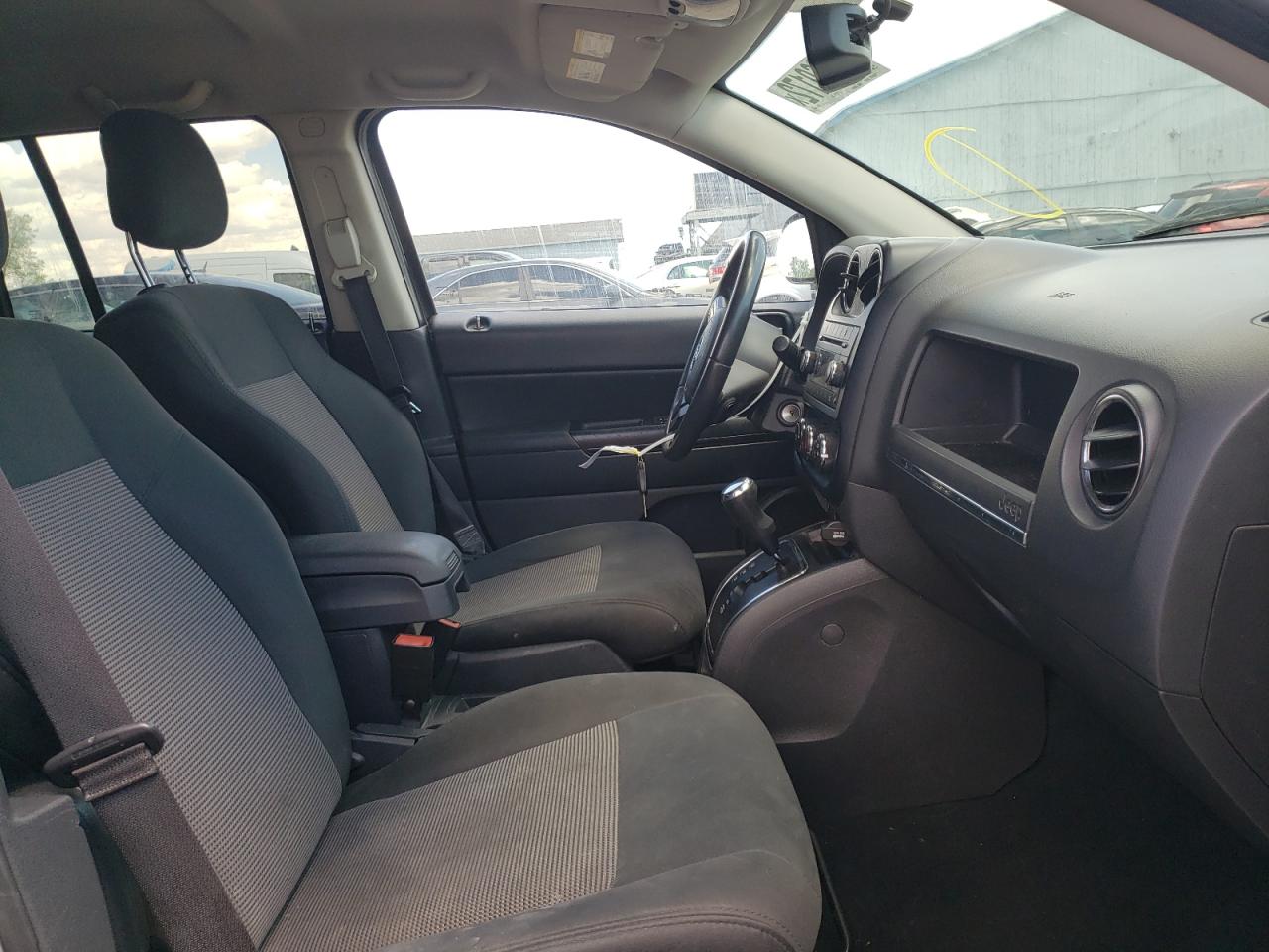 Photo 5 from auction – 2012 JEEP COMPASS LA with VIN 1C4NJCEB5CD514843