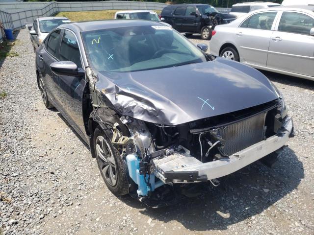 Photo 1 from auction – 2019 HONDA CIVIC LX with VIN 19XFC2F62KE034444