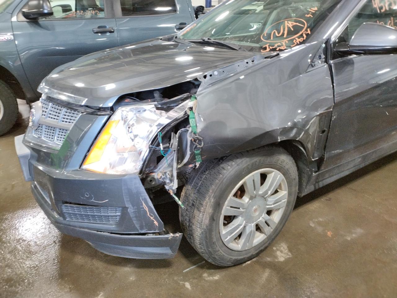 Photo 15 from auction – 2011 CADILLAC SRX LUXURY with VIN 3GYFNAEY2BS589543
