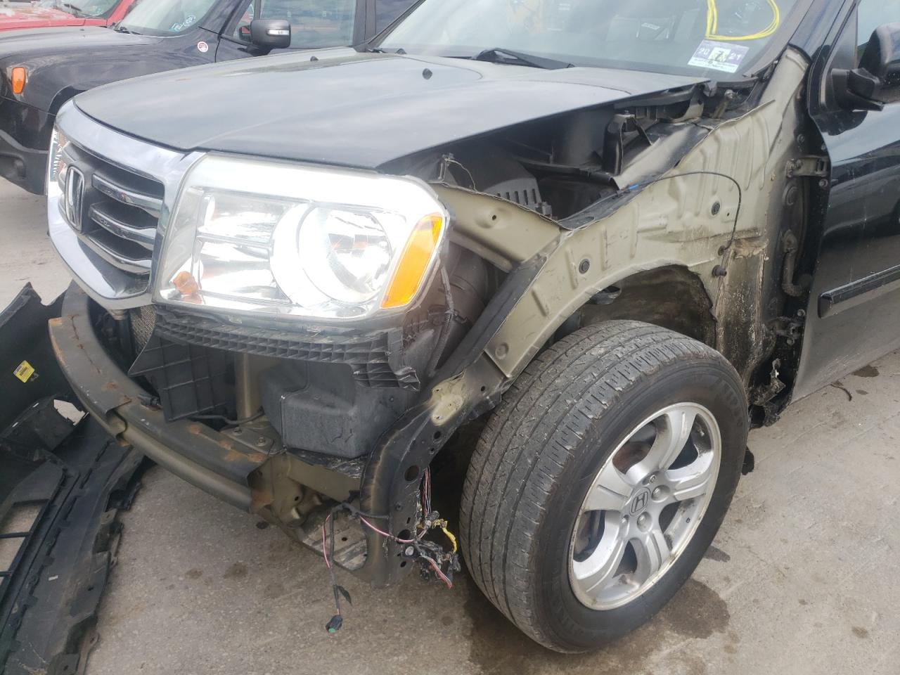 Photo 9 from auction – 2014 HONDA PILOT EXLN with VIN 5FNYF4H78EB011055