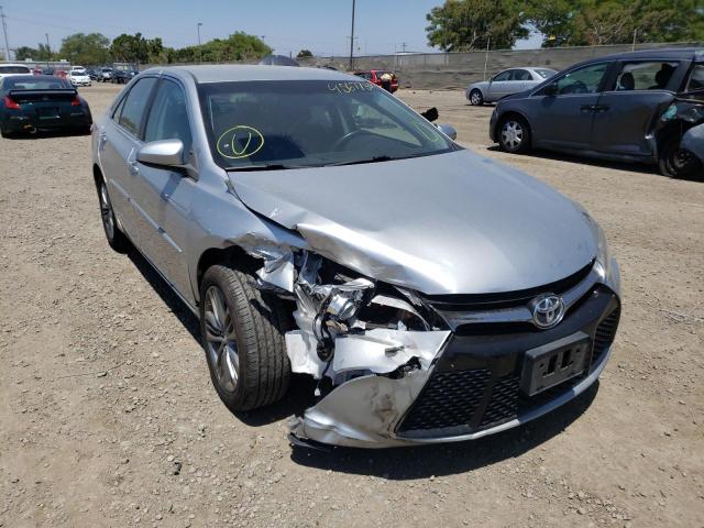 TOYOTA CAMRY LE 2015 with VIN 4T1BF1FKXFU890199 - Photo from auction