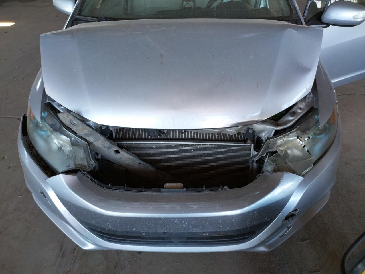 Photo 7 from auction – 2010 HONDA INSIGHT EX with VIN JHMZE2H75AS039077