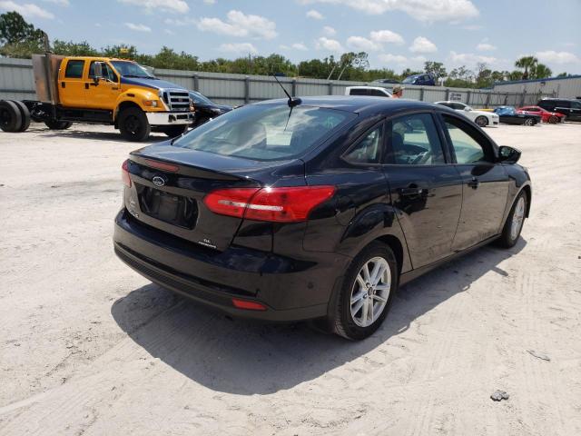 Photo 4 from auction – 2016 FORD FOCUS SE with VIN 1FADP3F28GL256893