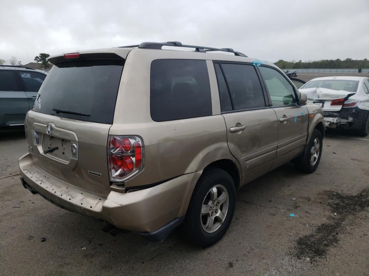 Photo 17 from auction – 2006 HONDA PILOT EX with VIN 2HKYF18566H505432