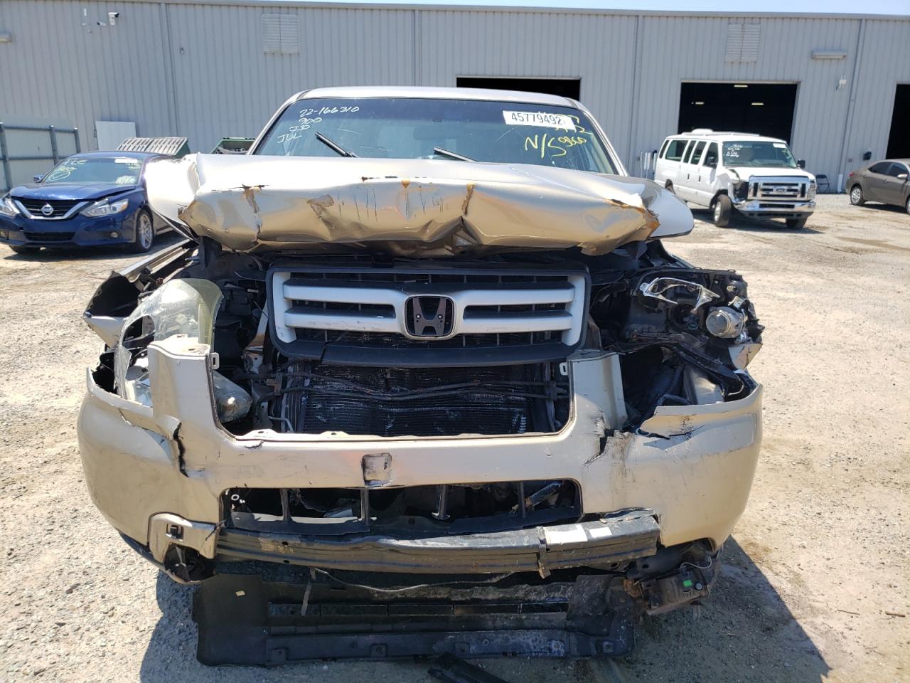Photo 18 from auction – 2006 HONDA PILOT LX with VIN 5FNYF28126B050421