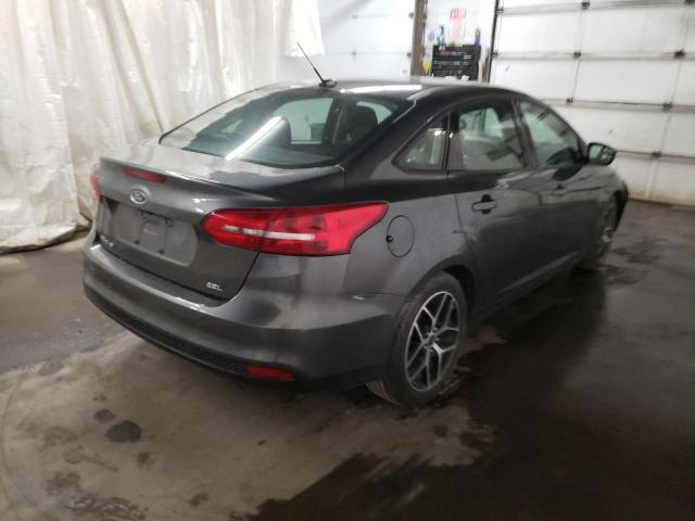 Photo 4 from auction – 2018 FORD FOCUS SEL with VIN 1FADP3H20JL202105