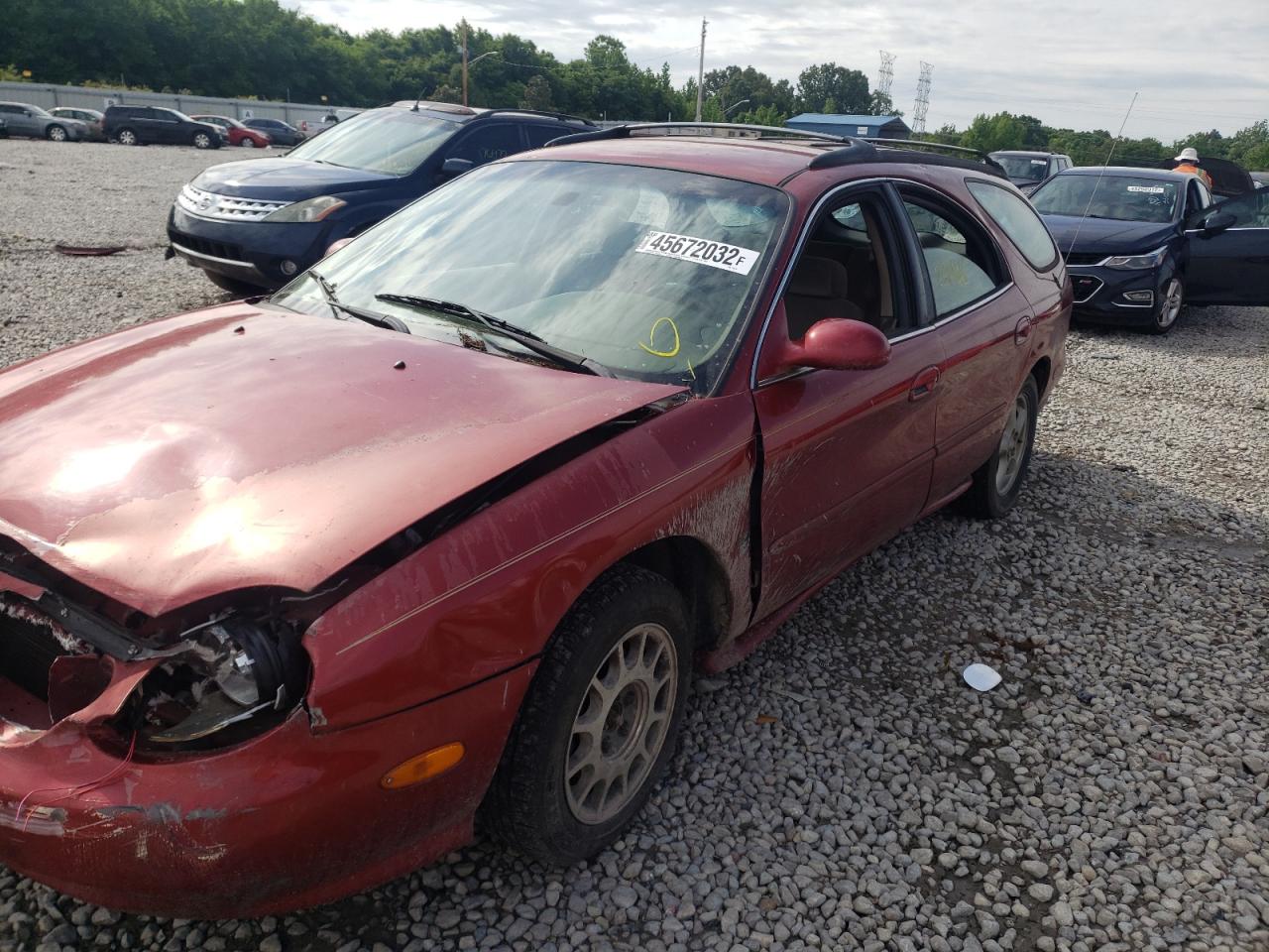 Photo 9 from auction – 1999 FORD TAURUS SE with VIN 1FAFP58S8XA158279