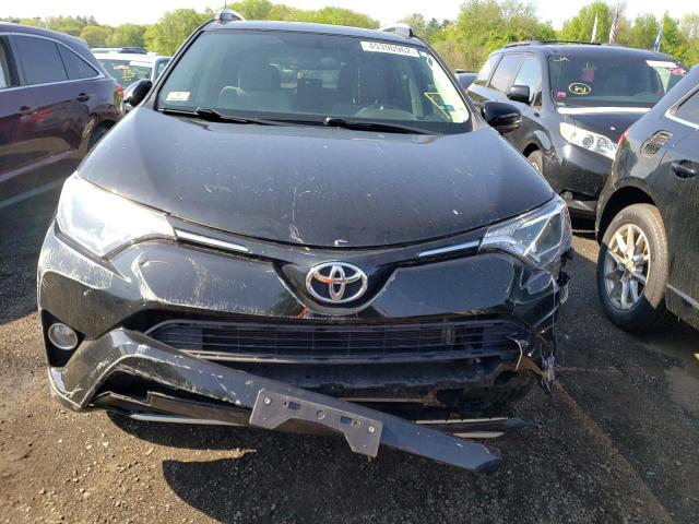 Photo 9 from auction – 2016 TOYOTA RAV4 XLE with VIN 2T3RFREV1GW438711