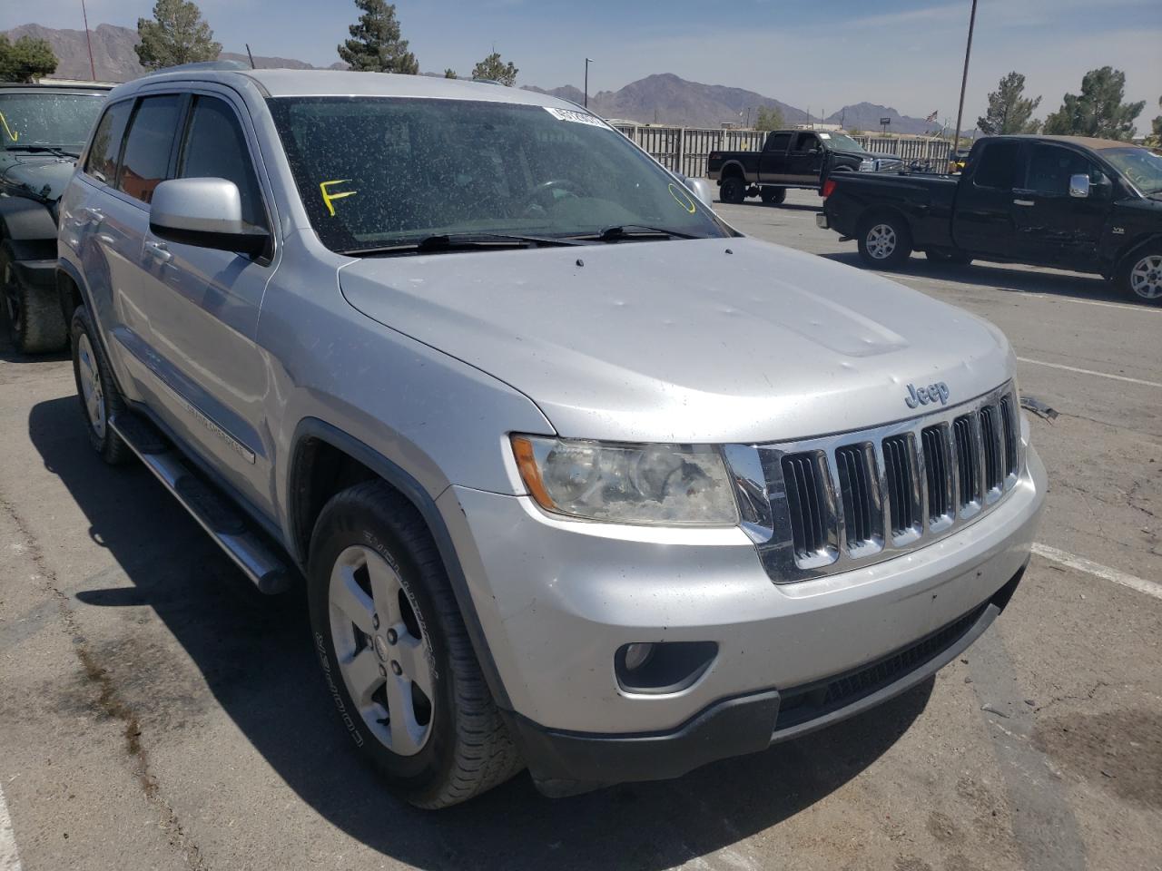 JEEP GRAND CHER 2011 with VIN 1J4RS4GG5BC615604 - Photo from auction