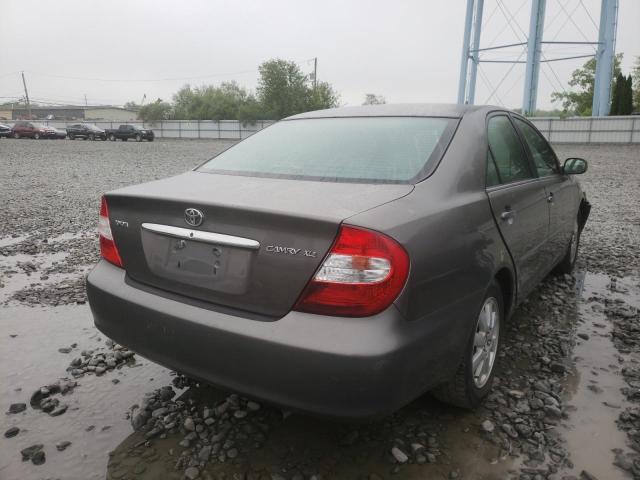 Photo 4 from auction – 2002 TOYOTA CAMRY LE with VIN 4T1BE30K32U640529
