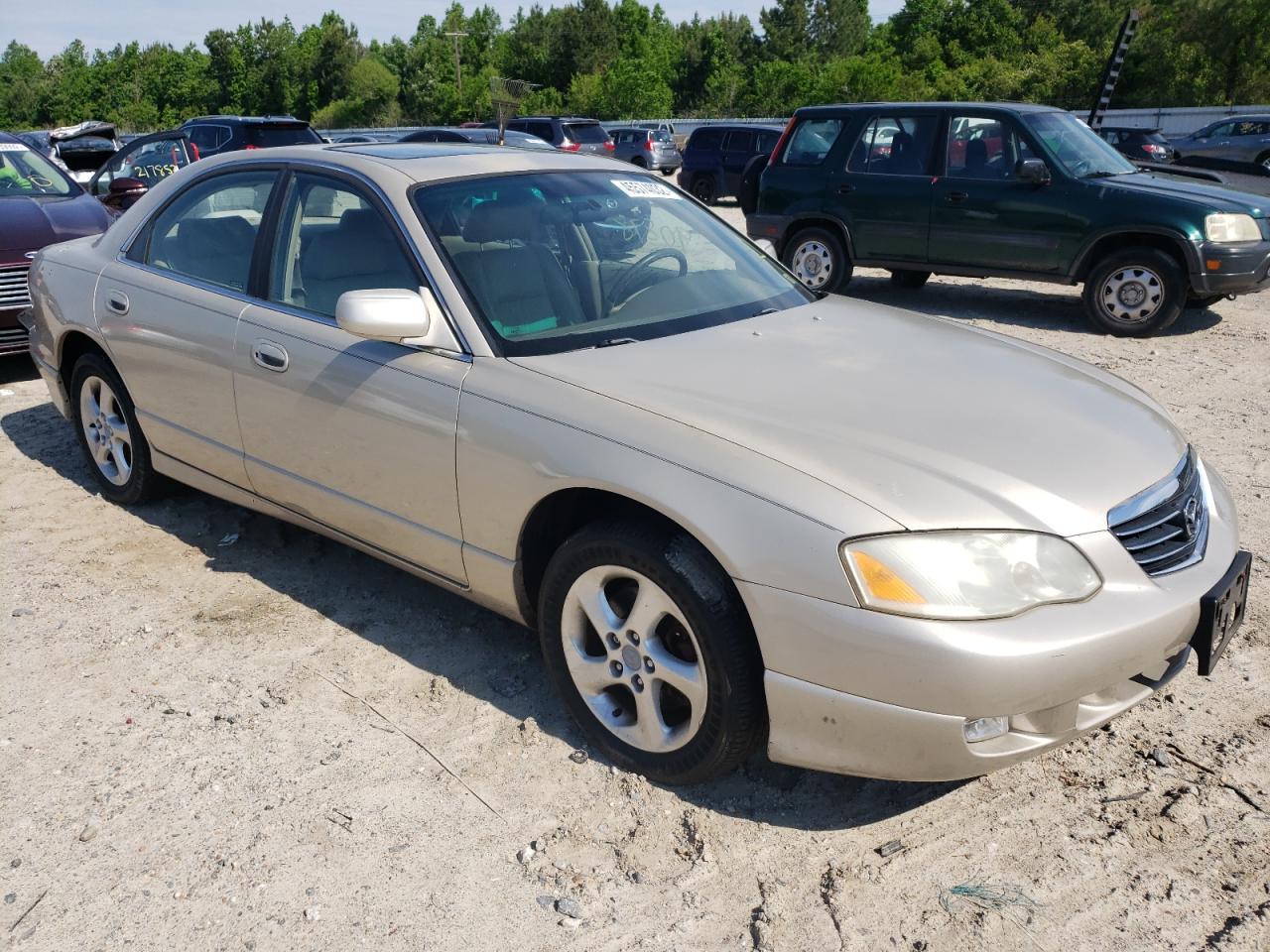 MAZDA MILLENIA 2002 with VIN JM1TA221521729815 - Photo from auction