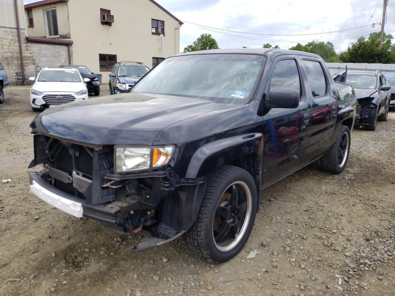 Photo 2 from auction – 2007 HONDA RIDGELINE with VIN 2HJYK16237H551875