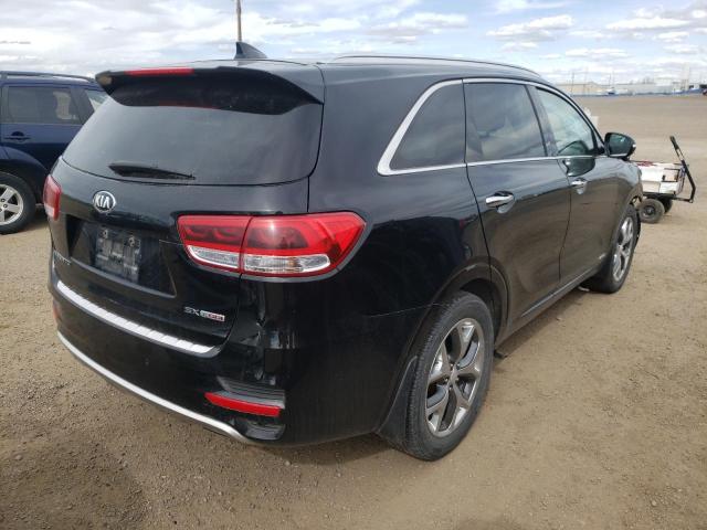 Photo 4 from auction – 2016 KIA SORENTO SX with VIN 5XYPKDA18GG052987