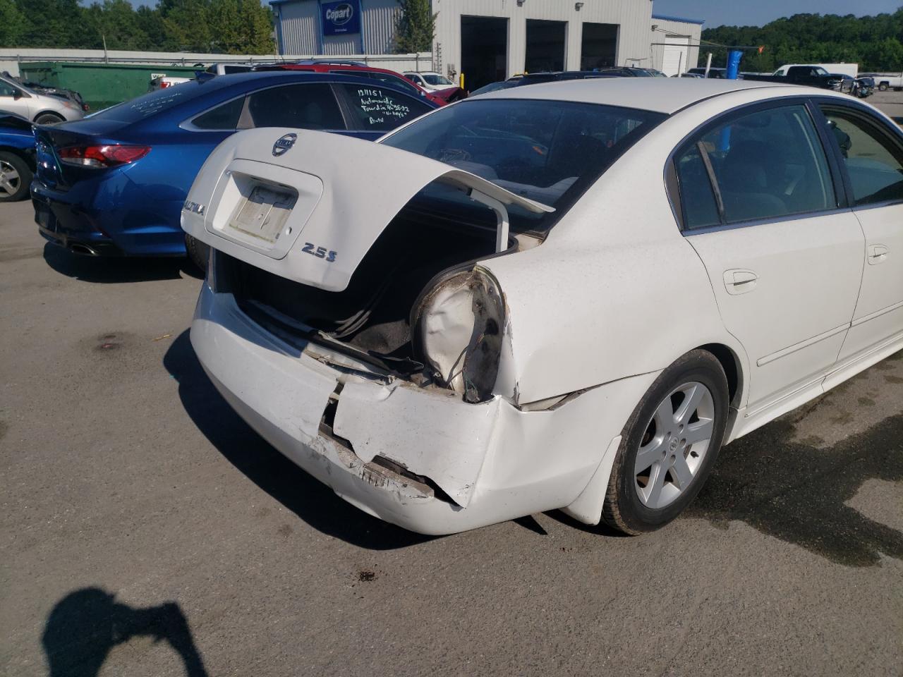 Photo 20 from auction – 2003 NISSAN ALTIMA BAS with VIN 1N4AL11D33C252479