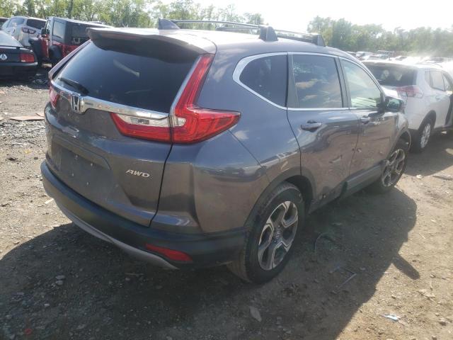 Photo 4 from auction – 2018 HONDA CR-V EX with VIN 7FARW2H56JE106039