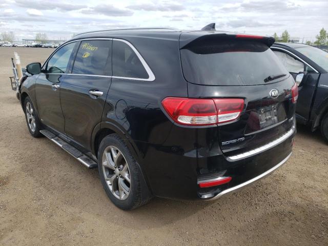 Photo 3 from auction – 2016 KIA SORENTO SX with VIN 5XYPKDA18GG052987