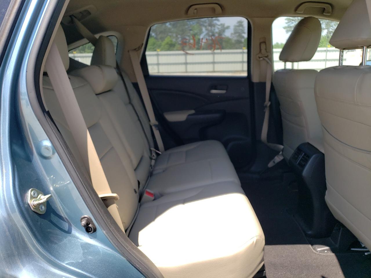Photo 6 from auction – 2016 HONDA CR-V SE with VIN 2HKRM3H47GH521475
