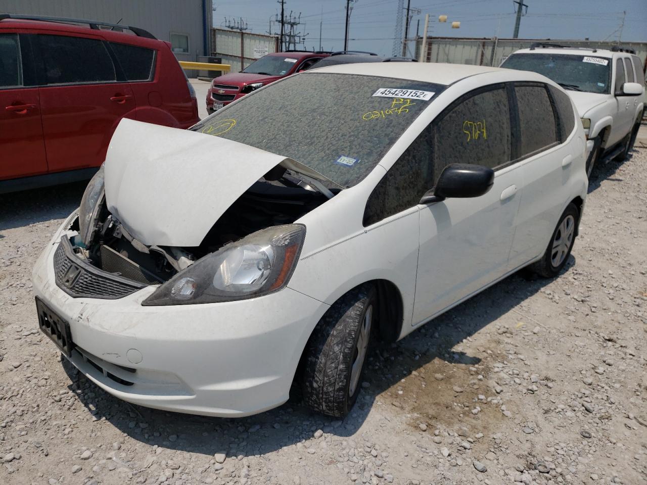 Photo 2 from auction – 2009 HONDA FIT with VIN JHMGE88299S021935