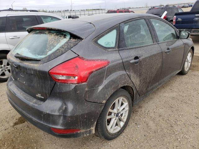 Photo 4 from auction – 2015 FORD FOCUS SE with VIN 1FADP3K2XFL309484