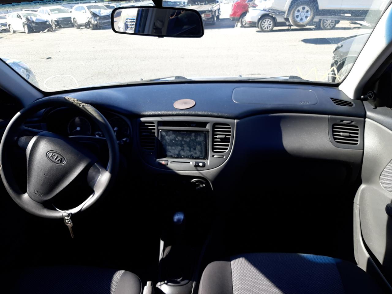 Photo 9 from auction – 2009 KIA RIO BASE with VIN KNADE223196490073