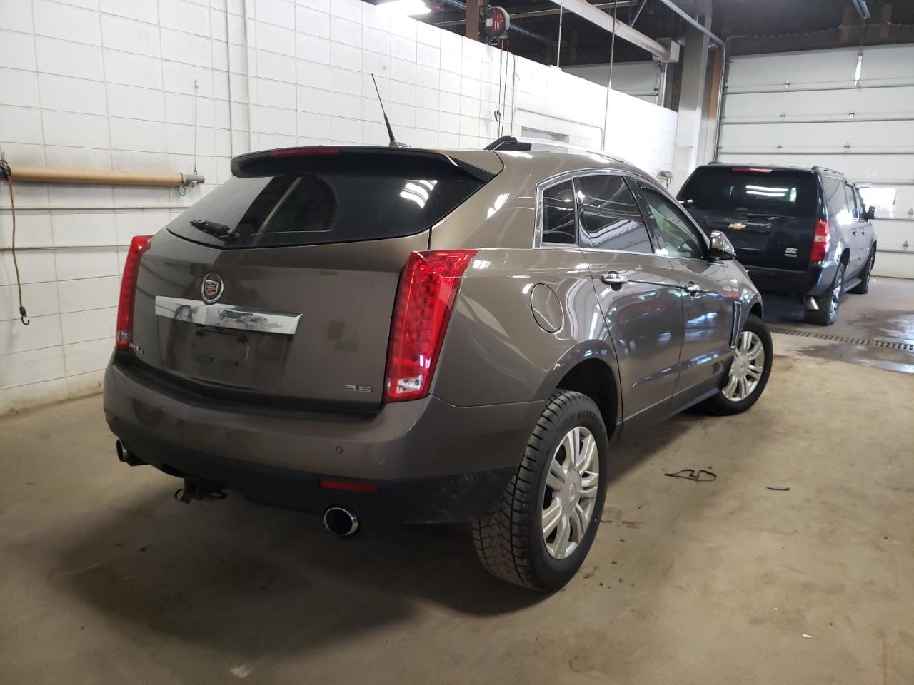Photo 4 from auction – 2014 CADILLAC SRX LUXURY with VIN 3GYFNEE3XES566527