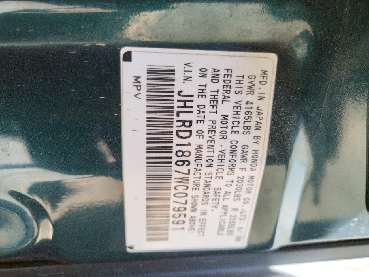 Photo 10 from auction – 1998 HONDA CR-V EX with VIN JHLRD1867WC079591