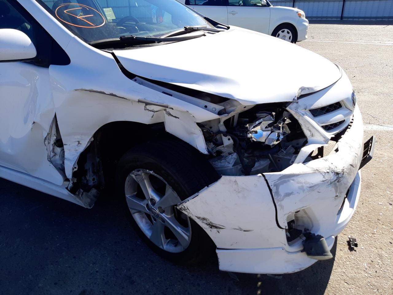 Photo 9 from auction – 2011 TOYOTA COROLLA BA with VIN 2T1BU4EE9BC742401