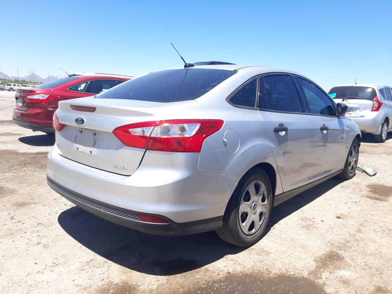 Photo 4 from auction – 2014 FORD FOCUS S with VIN 1FADP3E25EL231187