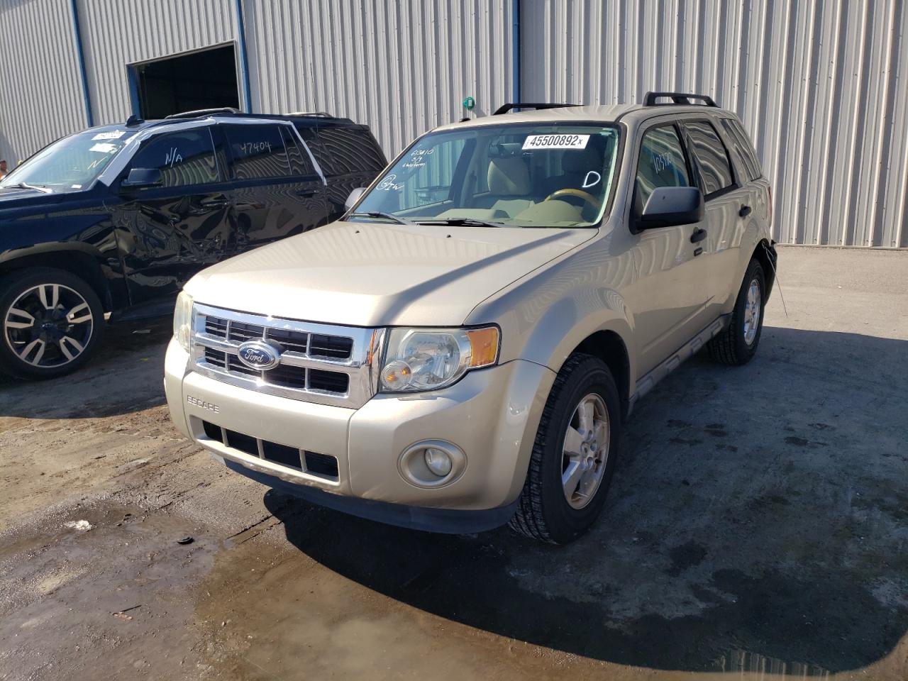 Photo 2 from auction – 2011 FORD ESCAPE XLT with VIN 1FMCU0DG9BKB65928