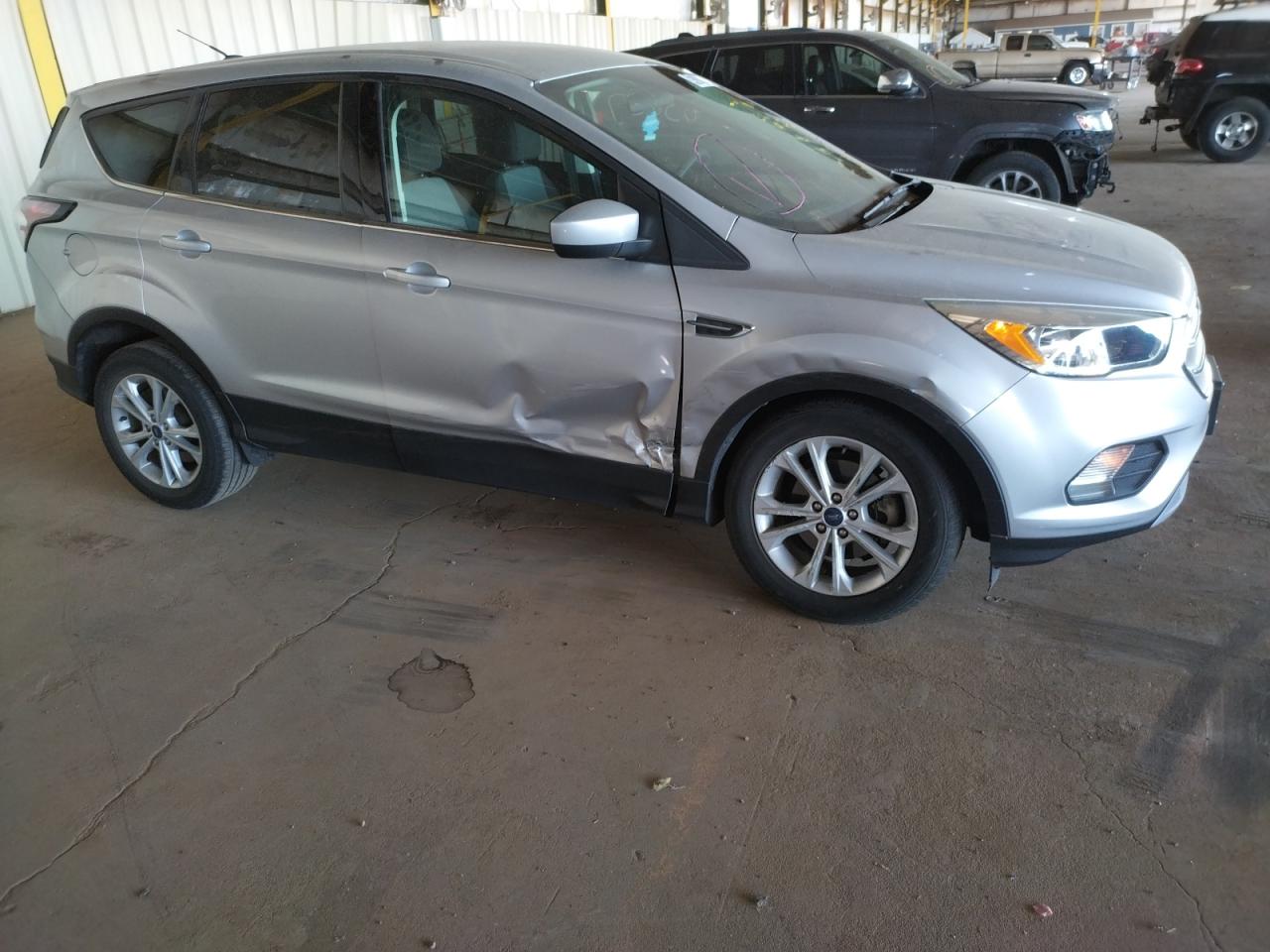 Photo 9 from auction – 2017 FORD ESCAPE SE with VIN 1FMCU0GD8HUC80759