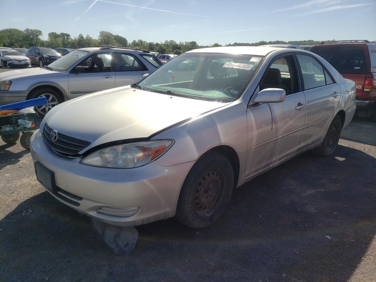 Photo 2 from auction – 2002 TOYOTA CAMRY LE with VIN JTDBE32K320111252