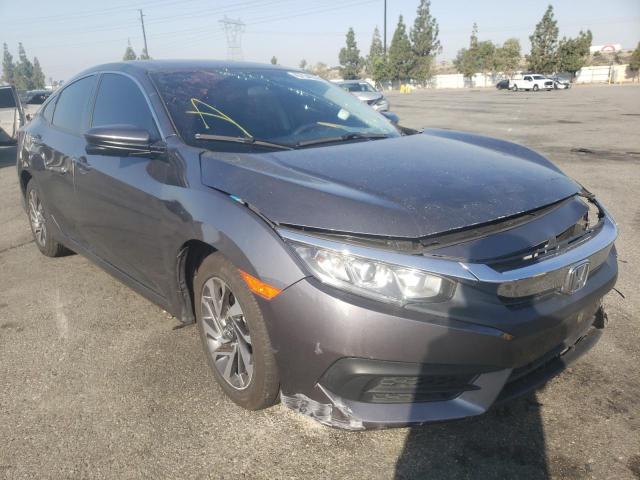 HONDA CIVIC EX 2018 with VIN 2HGFC2F76JH580841 - Photo from auction