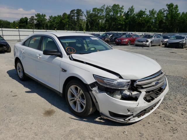 FORD TAURUS SE 2015 with VIN 1FAHP2D84FG166828 - Photo from auction