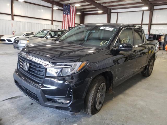 Photo 2 from auction – 2022 HONDA RIDGELINE with VIN 5FPYK3F58NB021373