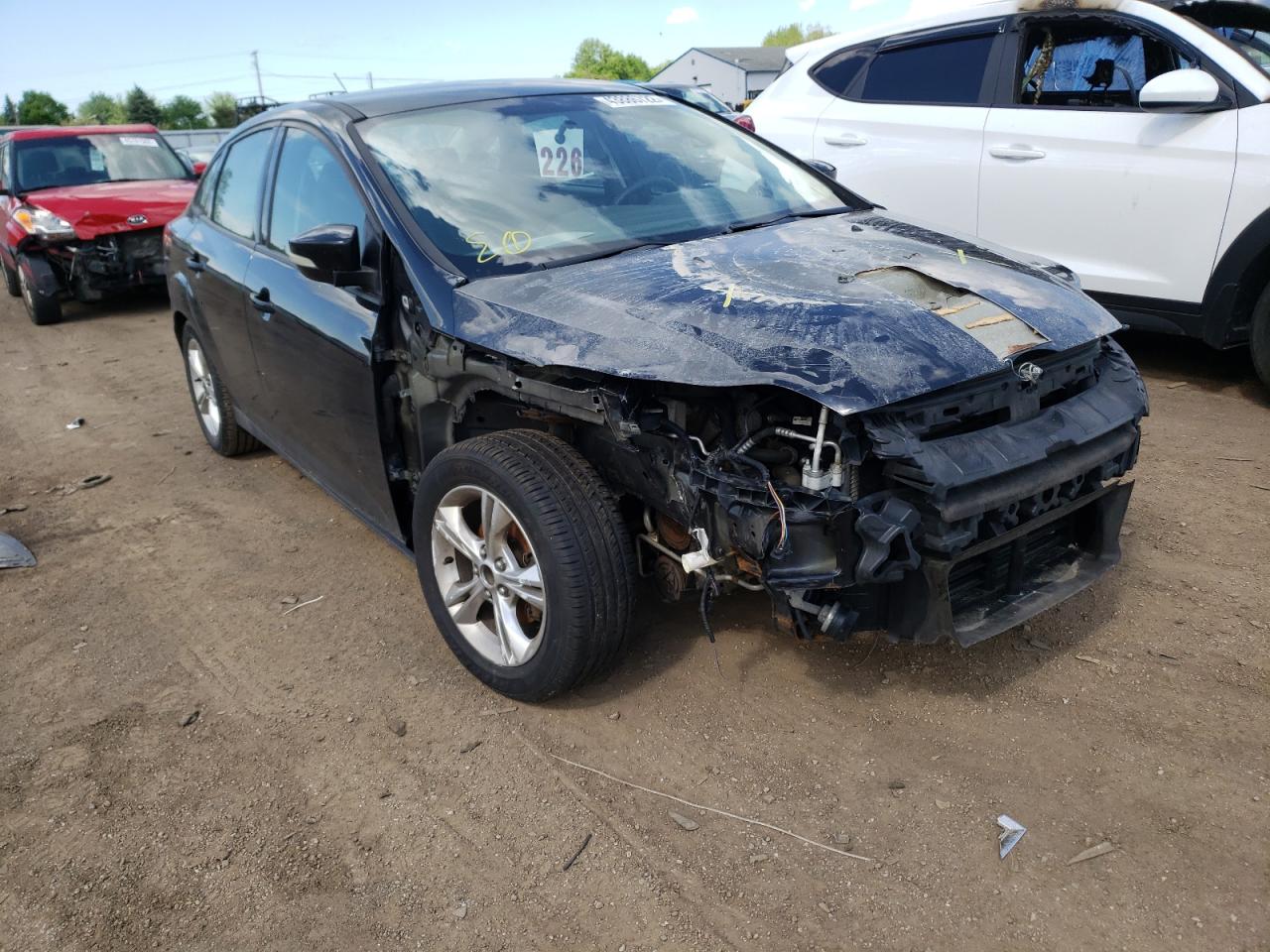 FORD FOCUS SE 2014 with VIN 1FADP3F25EL116152 - Photo from auction