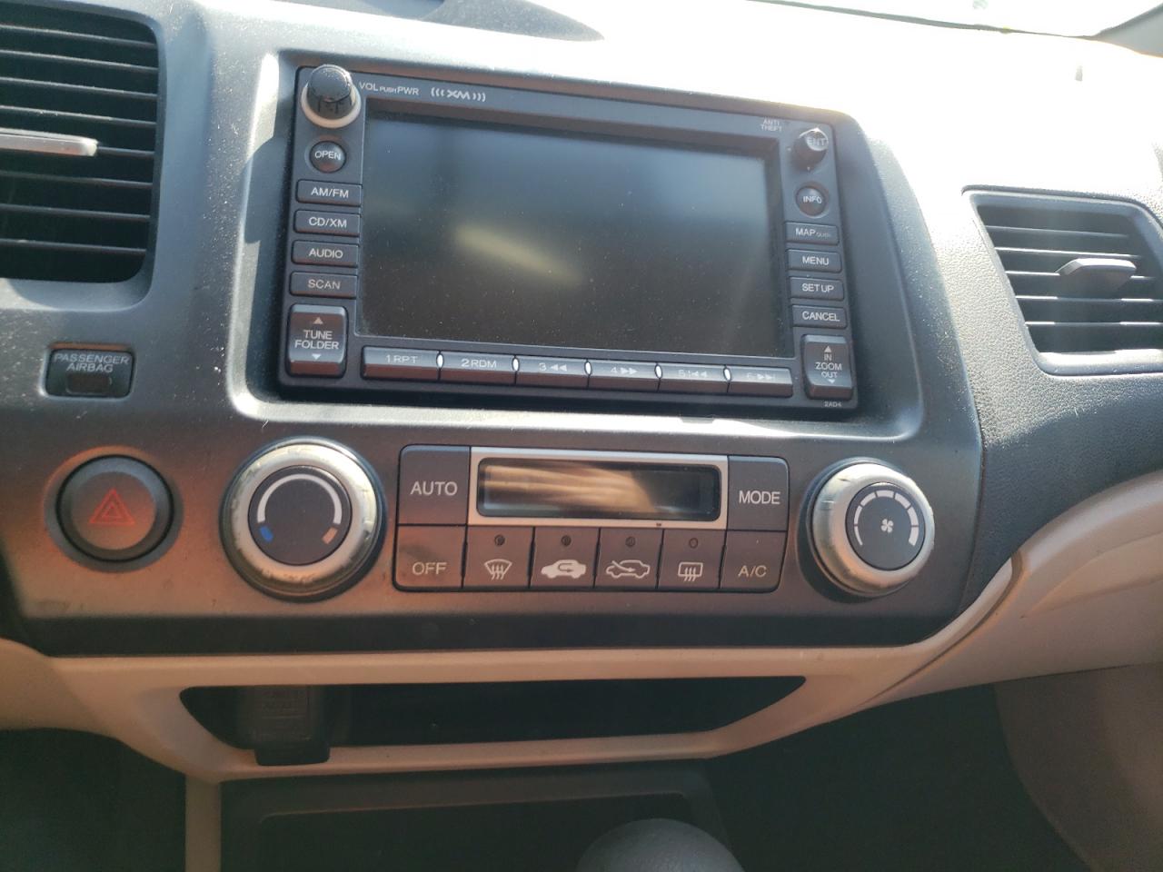 Photo 9 from auction – 2007 HONDA CIVIC HYBR with VIN JHMFA362X7S010226