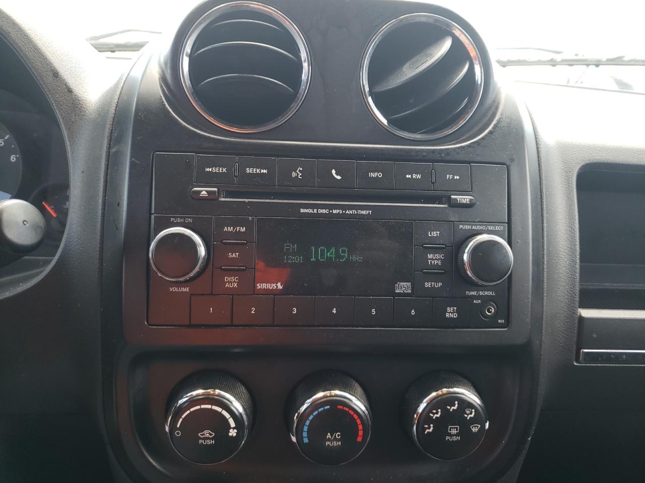 Photo 9 from auction – 2012 JEEP COMPASS LA with VIN 1C4NJCEB5CD514843