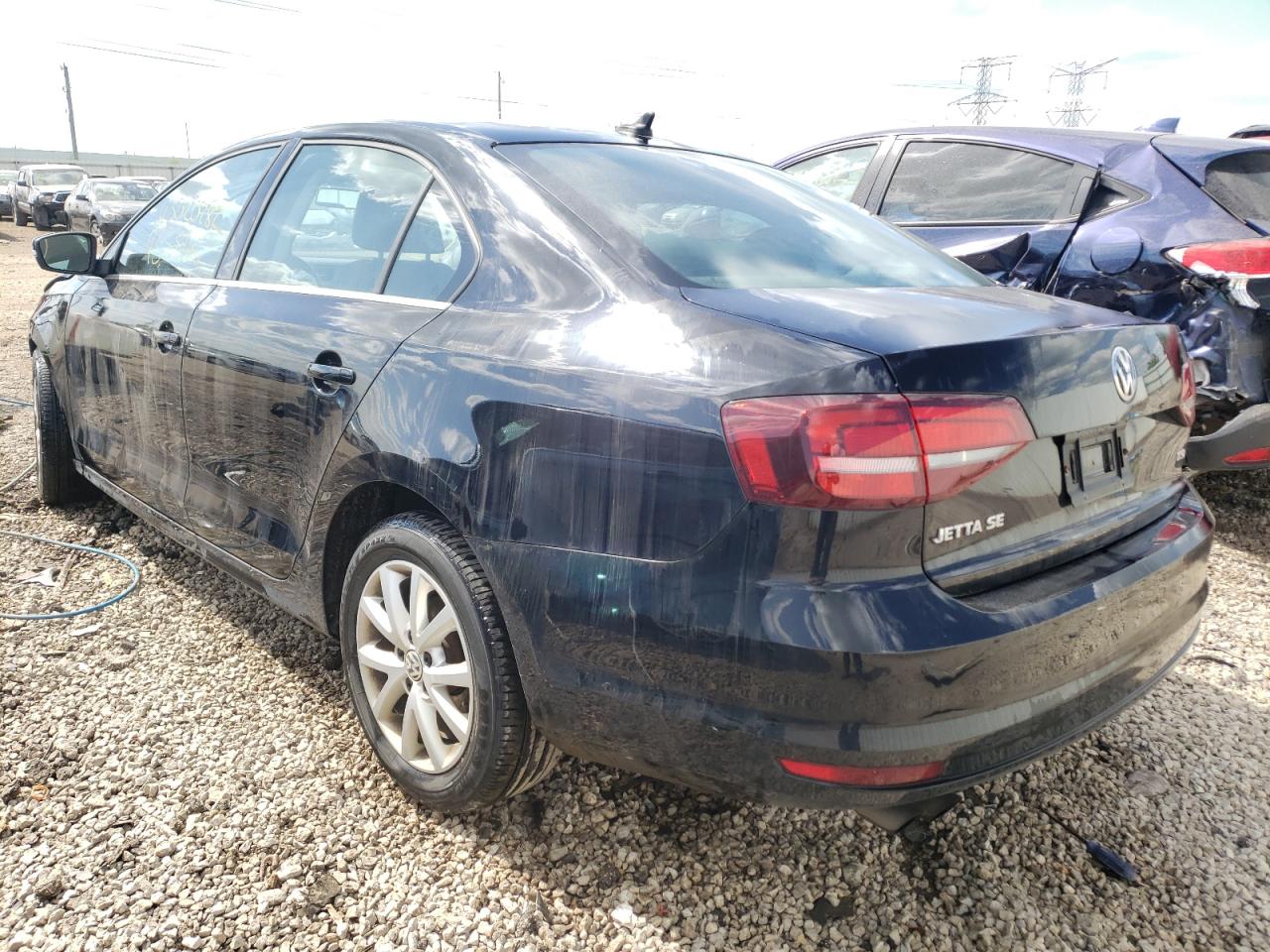 Photo 3 from auction – 2017 VOLKSWAGEN JETTA SE with VIN 3VWDB7AJ9HM361115