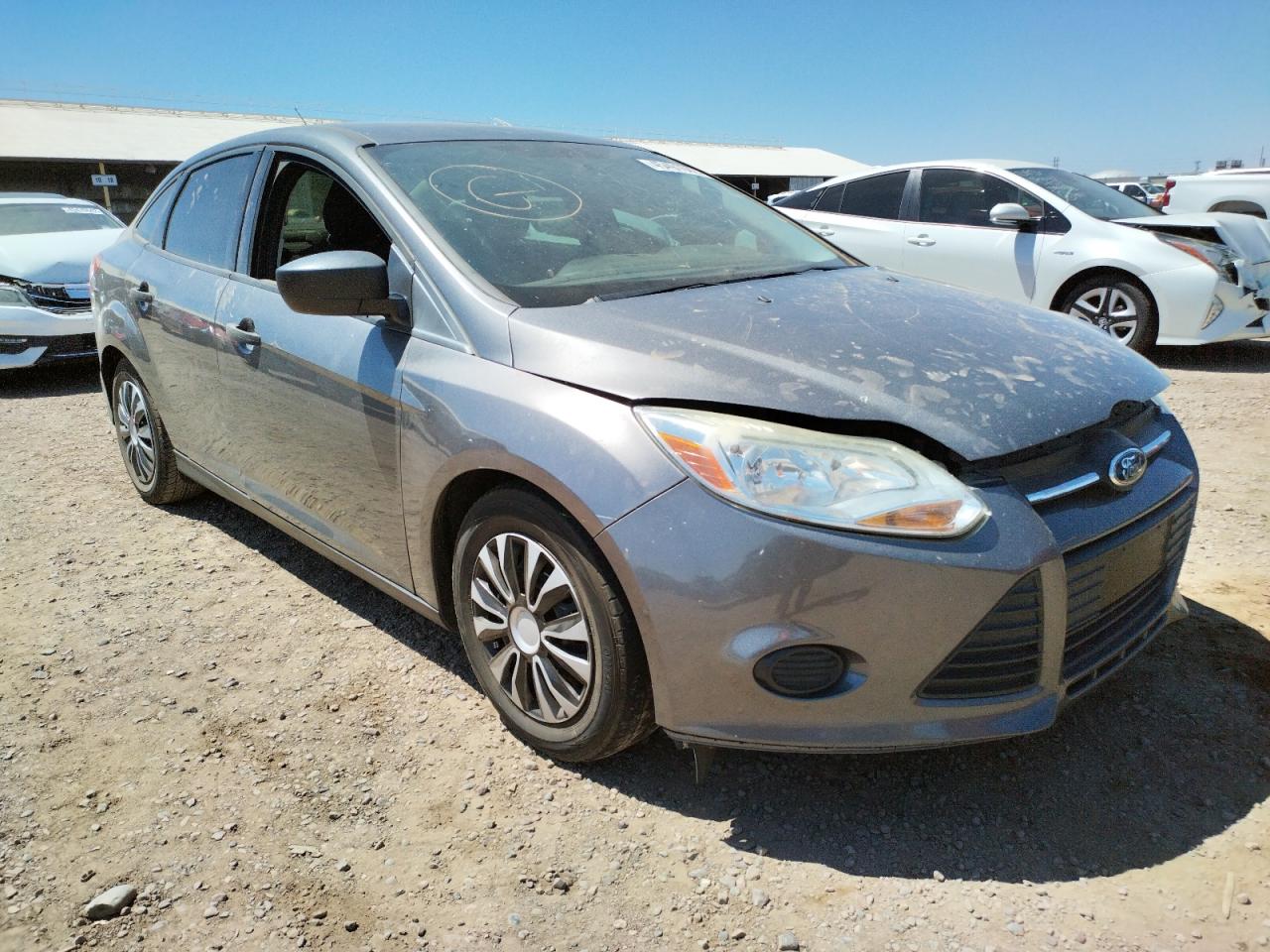 FORD FOCUS S 2014 with VIN 1FADP3E22EL451449 - Photo from auction