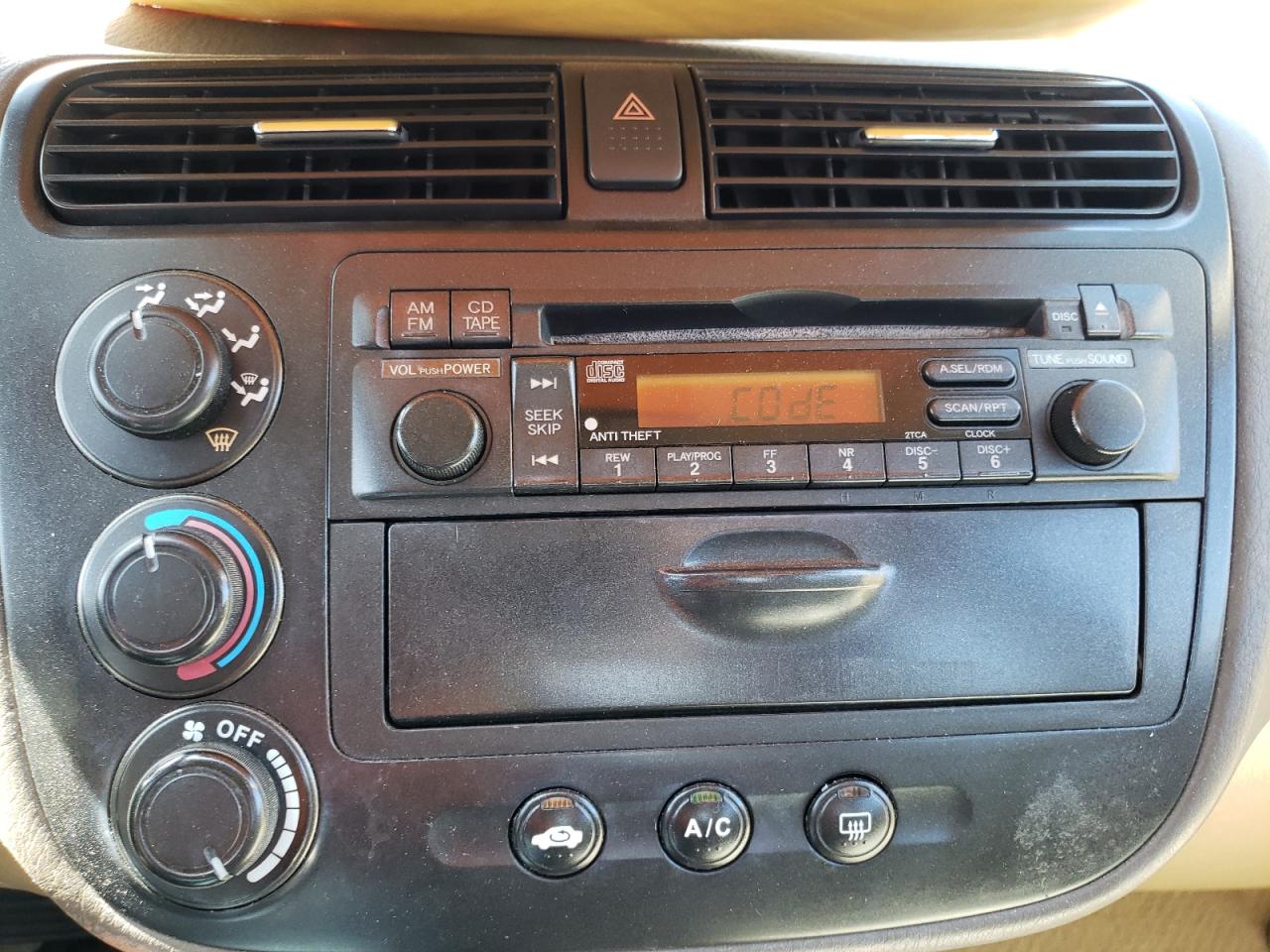 Photo 9 from auction – 2004 HONDA CIVIC LX with VIN 2HGES16594H593563