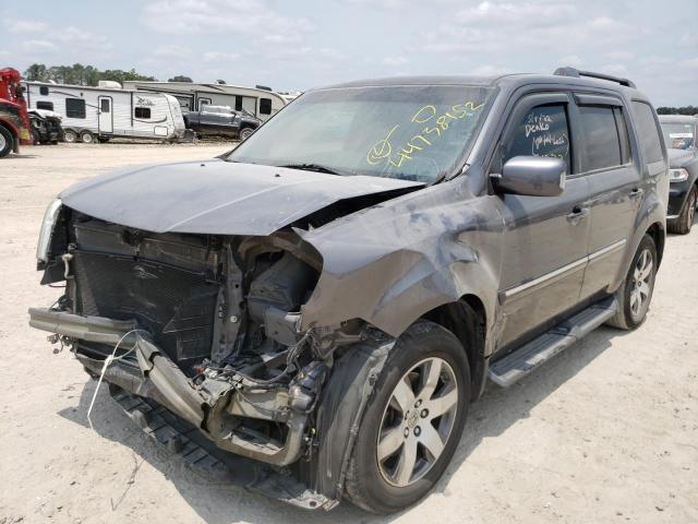 Photo 2 from auction – 2014 HONDA PILOT TOUR with VIN 5FNYF3H94EB010352
