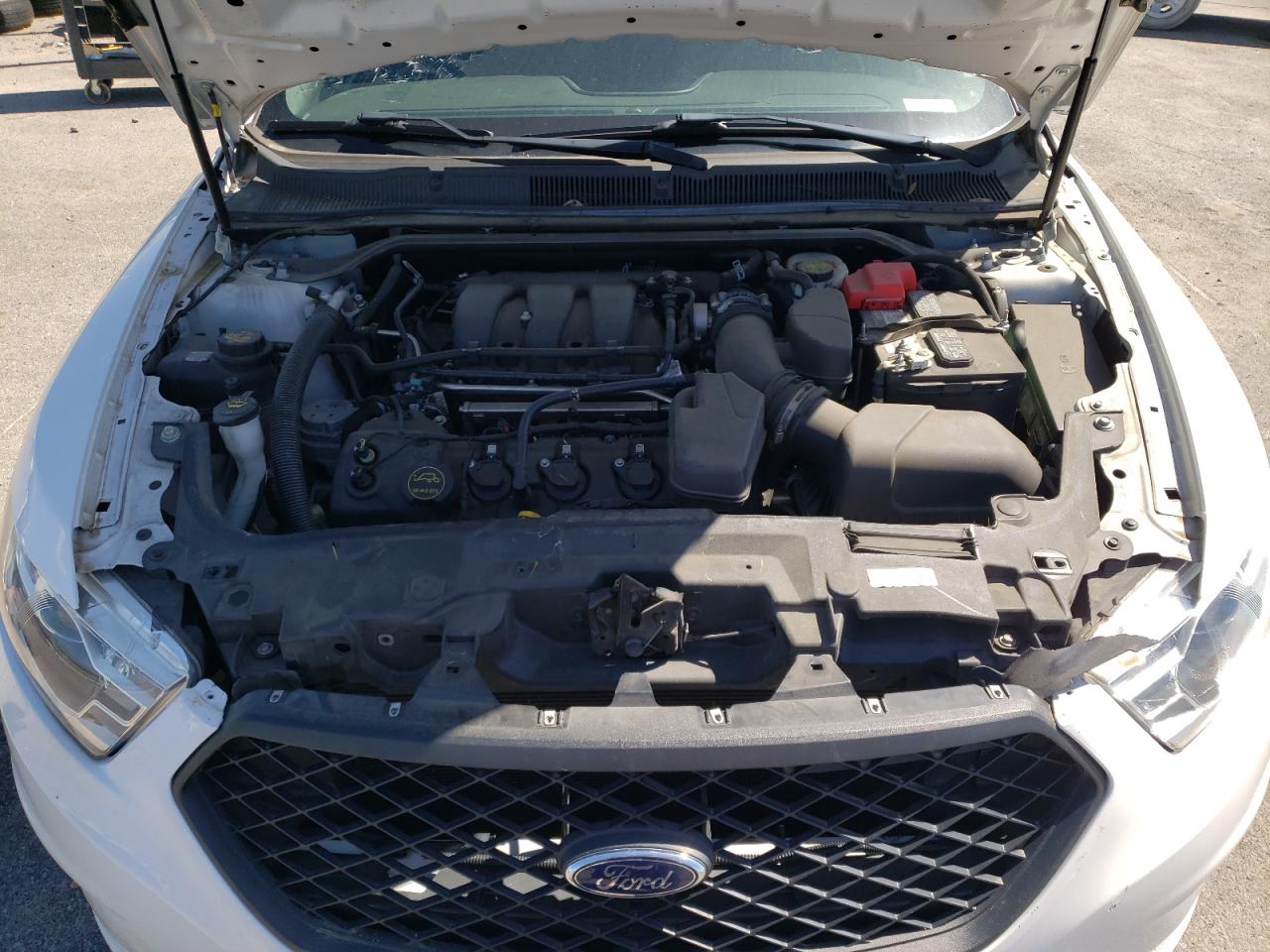 Photo 7 from auction – 2018 FORD TAURUS POL with VIN 1FAHP2L87JG143635