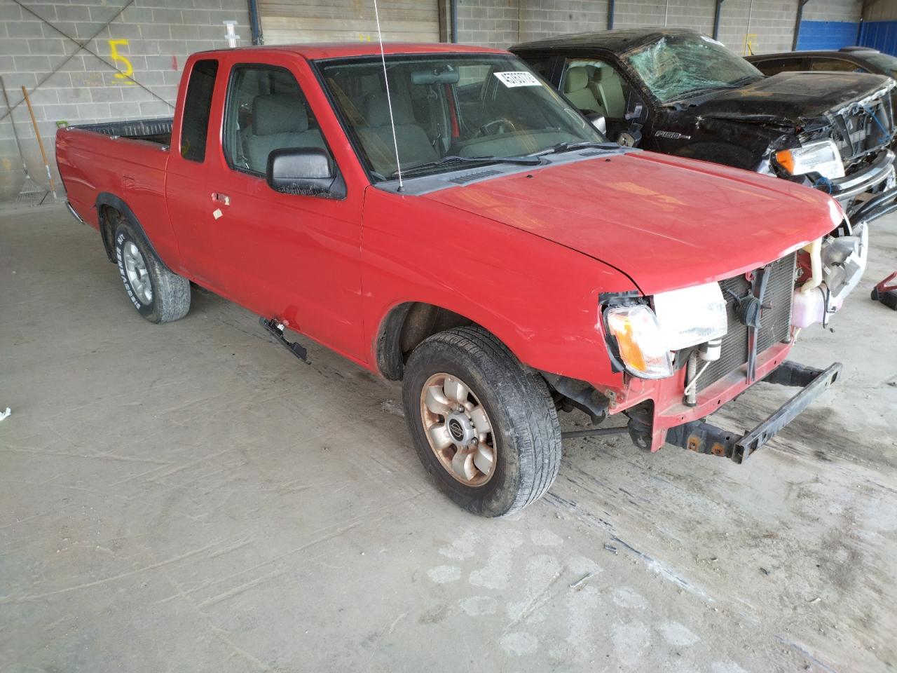 NISSAN FRONTIER 2000 with VIN 1N6DD26S1YC418939 - Photo from auction